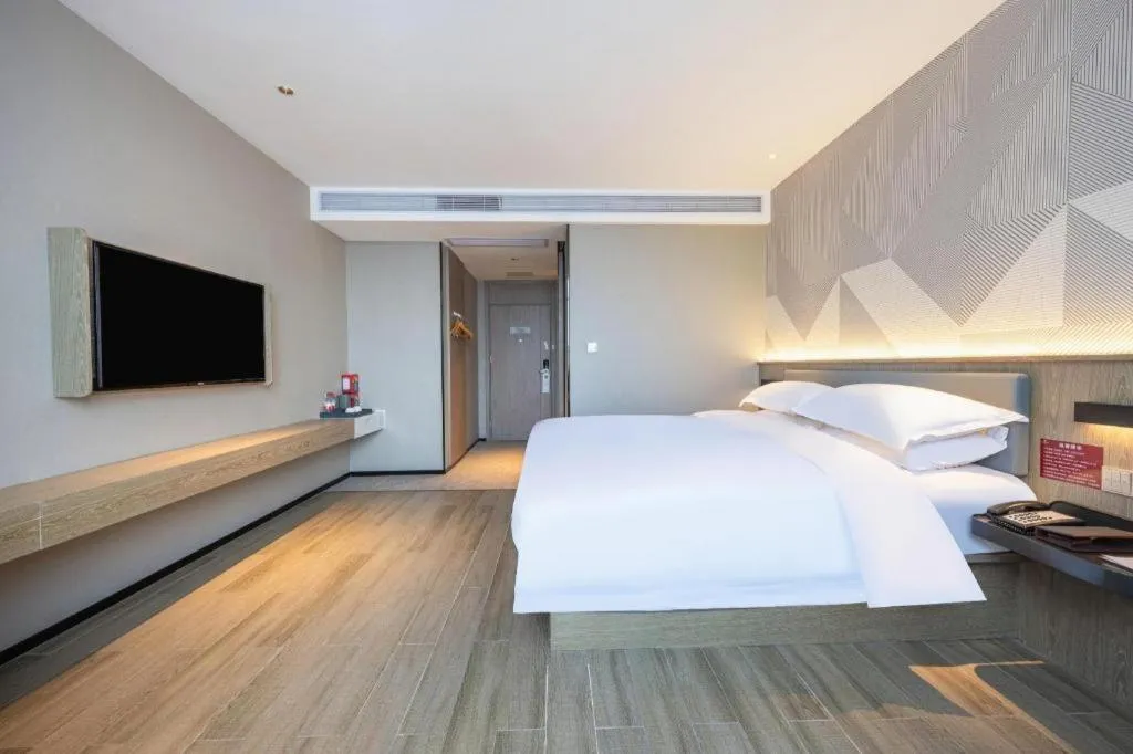 Bed in Borrman Hotel Lianjiang Avenue Xinyuan International Plaza