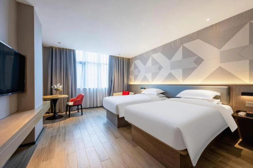 Bed in Borrman Hotel Lianjiang Avenue Xinyuan International Plaza