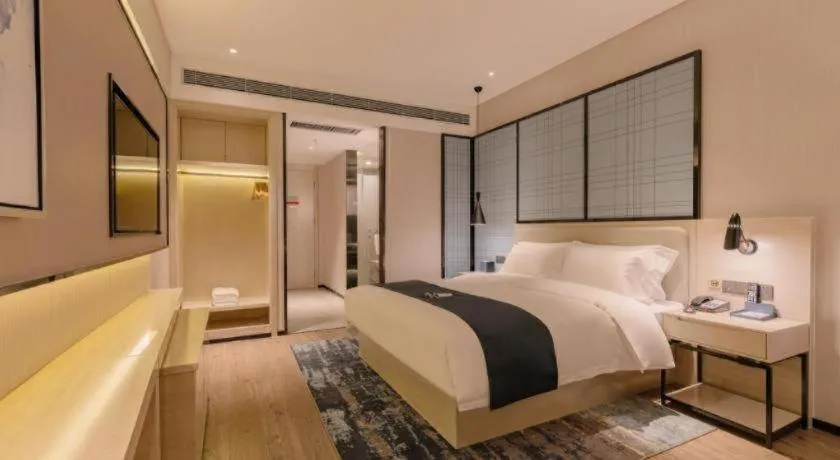 Bed in Echarm Hotel Yantai Wuzhou International
