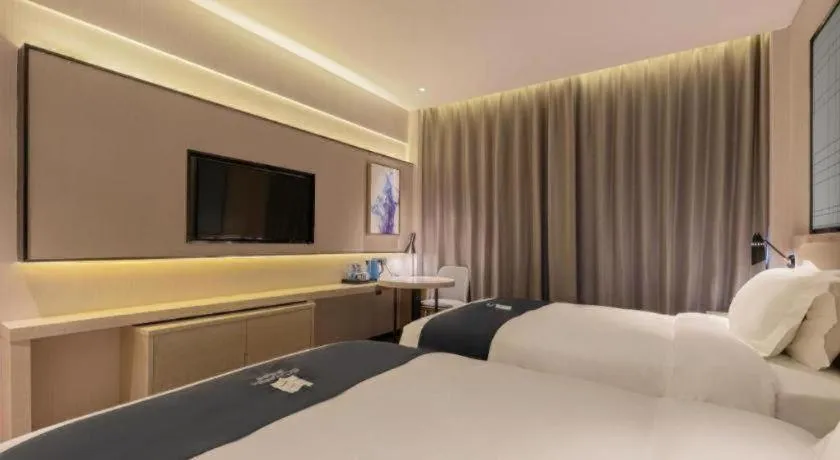 Bed in Echarm Hotel Yantai Wuzhou International