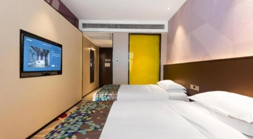 Bed in Borrman Hotel Wuhan Hankou Railway Station Metro Station