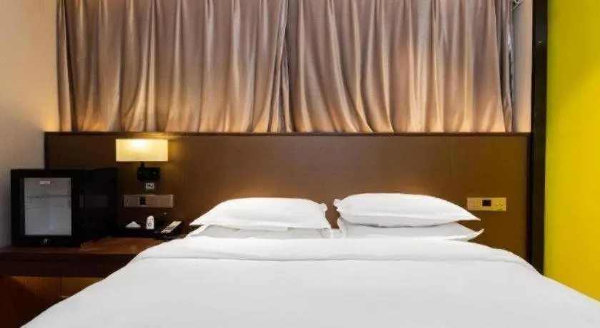 Bed in Borrman Hotel Wuhan Hankou Railway Station Metro Station