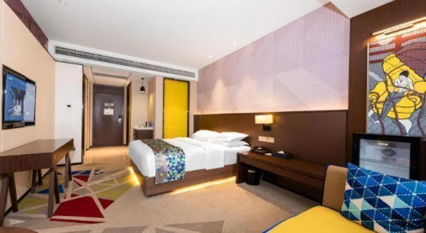 Bed in Borrman Hotel Wuhan Hankou Railway Station Metro Station