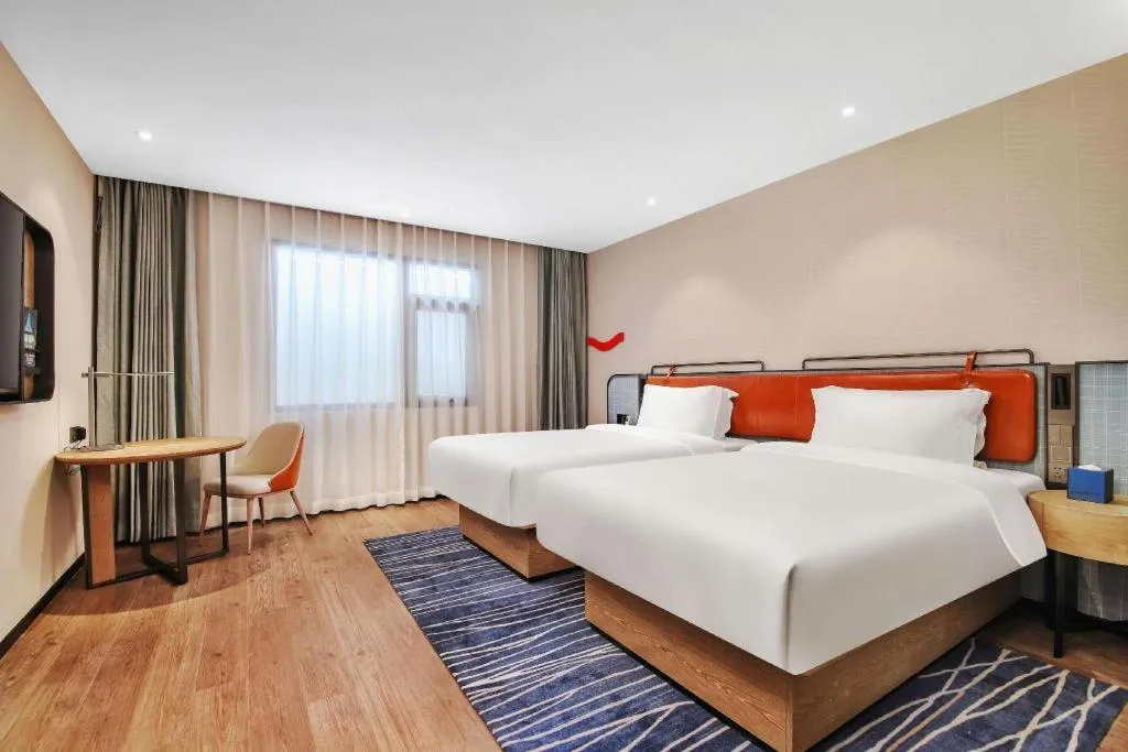 Bed in Echarm Hotel Nanjing Expo Center Olympic East Metro Station