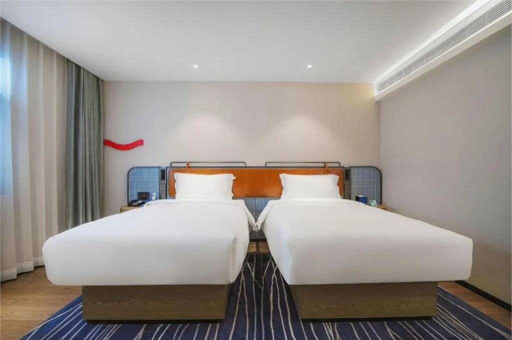 Bed in Echarm Hotel Nanjing Expo Center Olympic East Metro Station