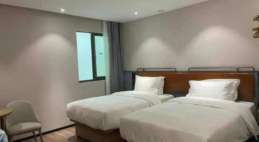 Bed in Echarm Hotel Nanjing Expo Center Olympic East Metro Station