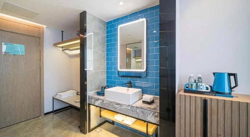 Bed in Echarm Hotel Nanjing Expo Center Olympic East Metro Station