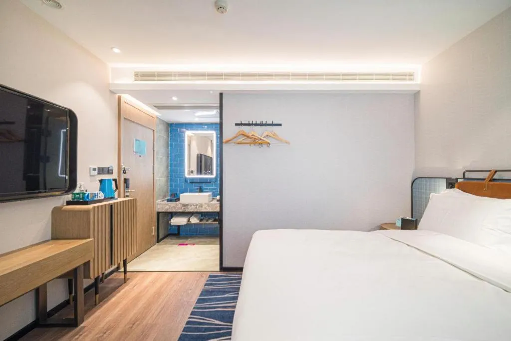 Bed in Echarm Hotel Nanjing Expo Center Olympic East Metro Station