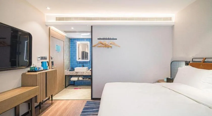 Bed in Echarm Hotel Nanjing Expo Center Olympic East Metro Station