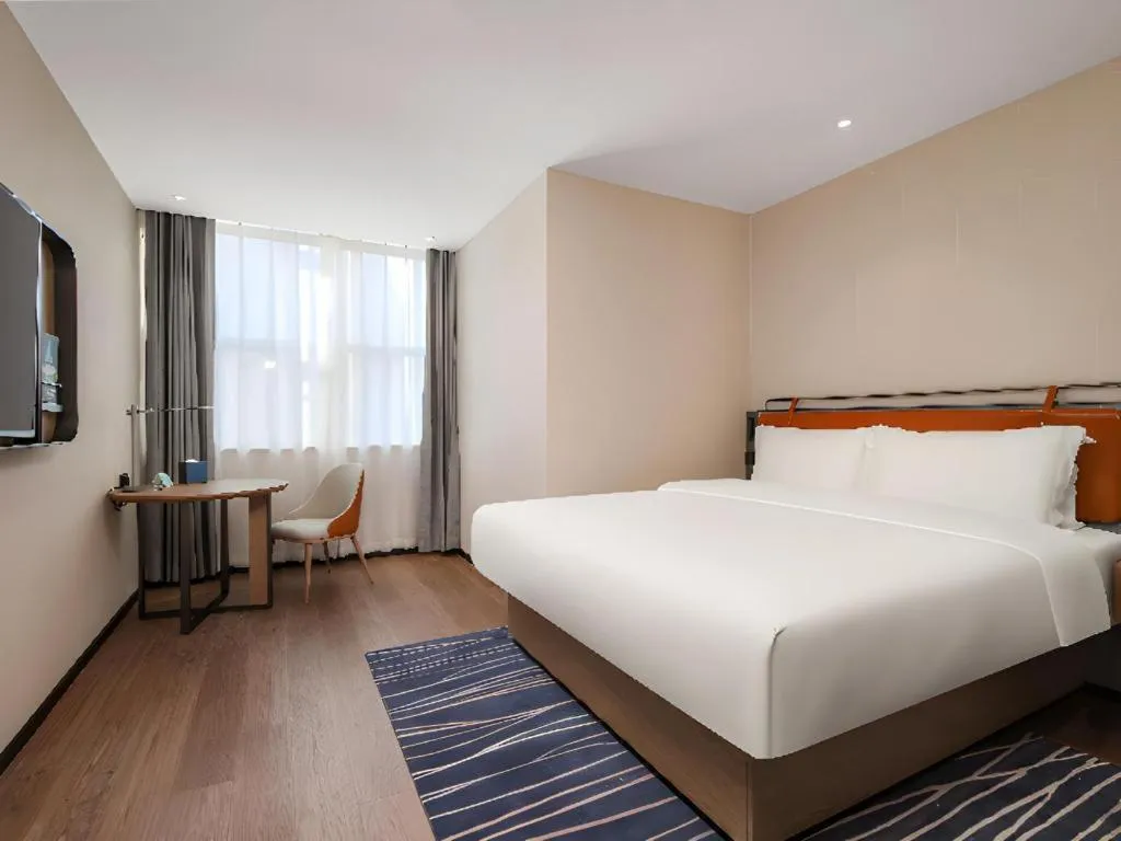 Bed in Echarm Hotel Nanjing Expo Center Olympic East Metro Station