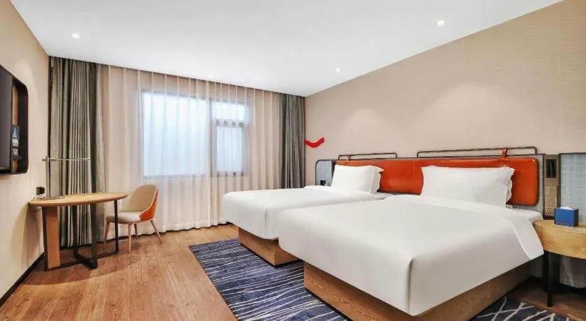 Bed in Echarm Hotel Nanjing Expo Center Olympic East Metro Station