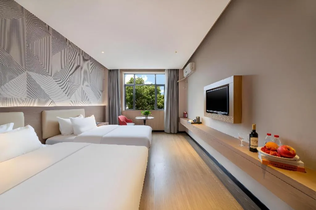 Bed in Borrman Hotel Xiantao Wushang Gymnasium