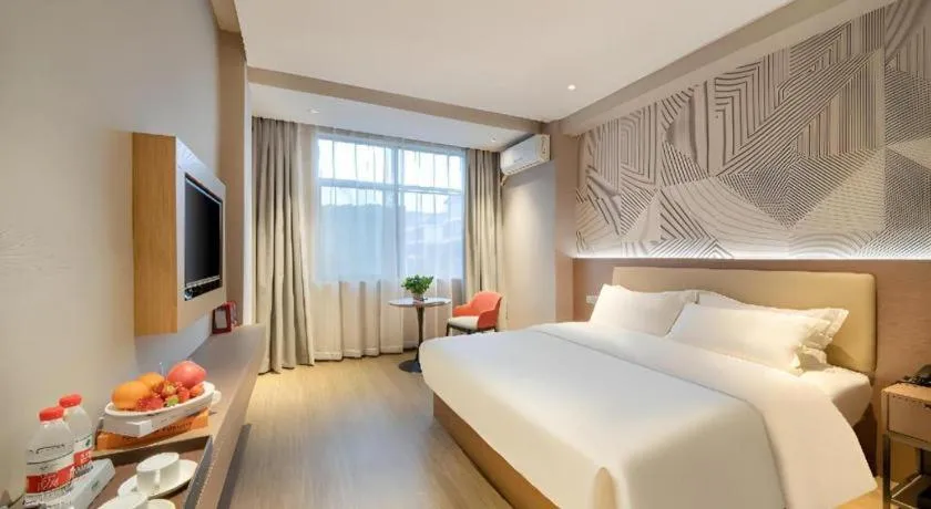 Bed in Borrman Hotel Xiantao Wushang Gymnasium