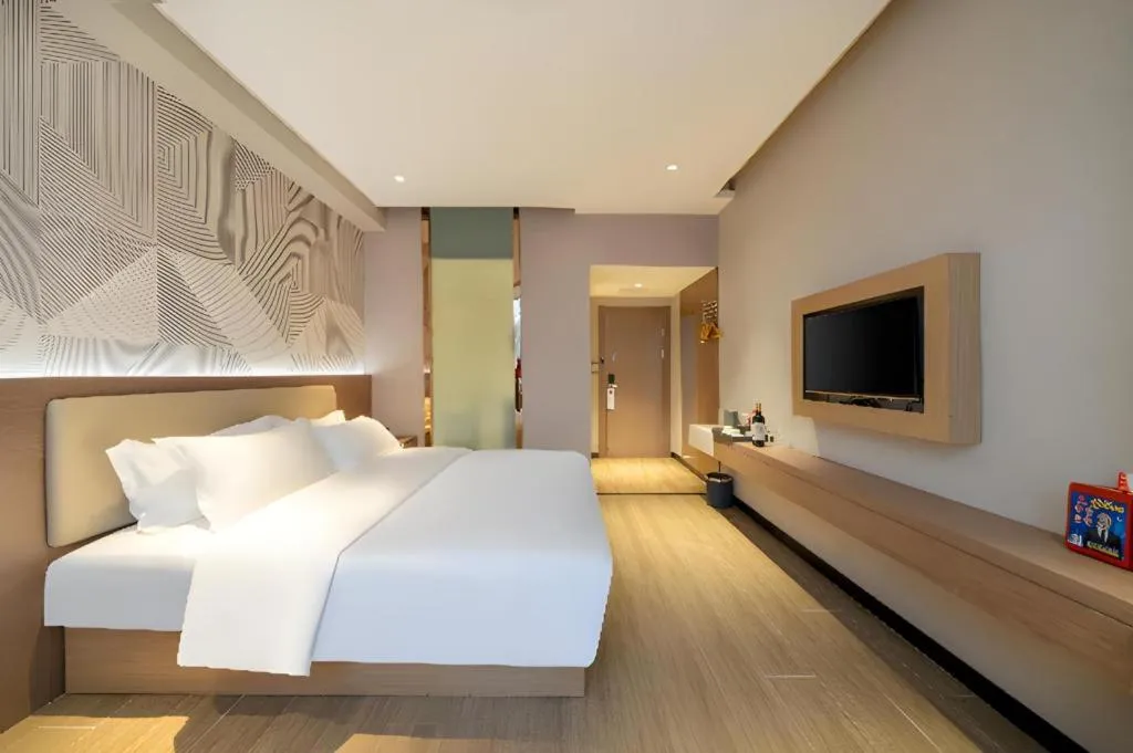 Bed in Borrman Hotel Xiantao Wushang Gymnasium