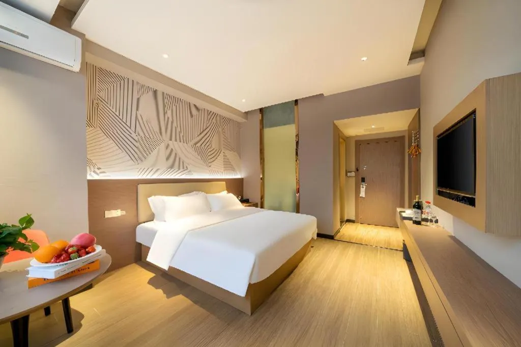 Bed in Borrman Hotel Xiantao Wushang Gymnasium