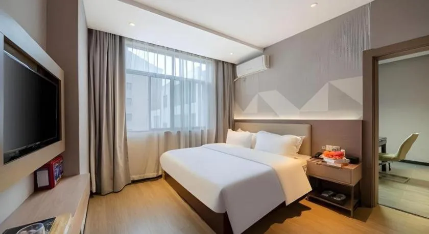 Bed in Borrman Hotel Xiantao Wushang Gymnasium