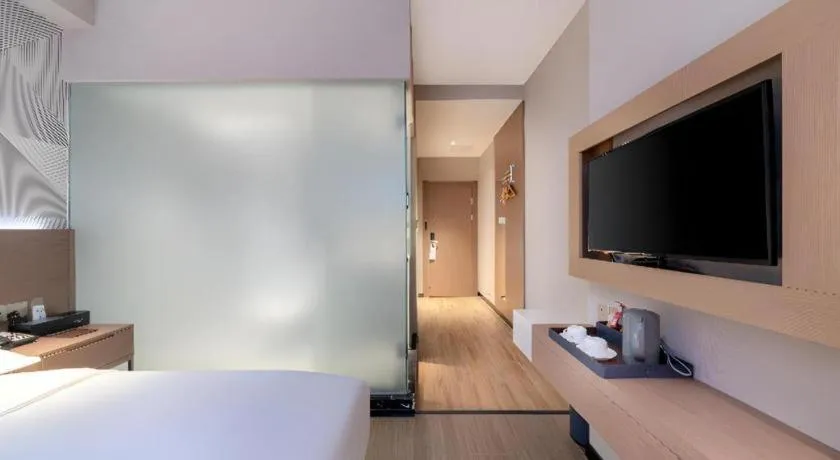 Bed in Borrman Hotel Xiantao Wushang Gymnasium