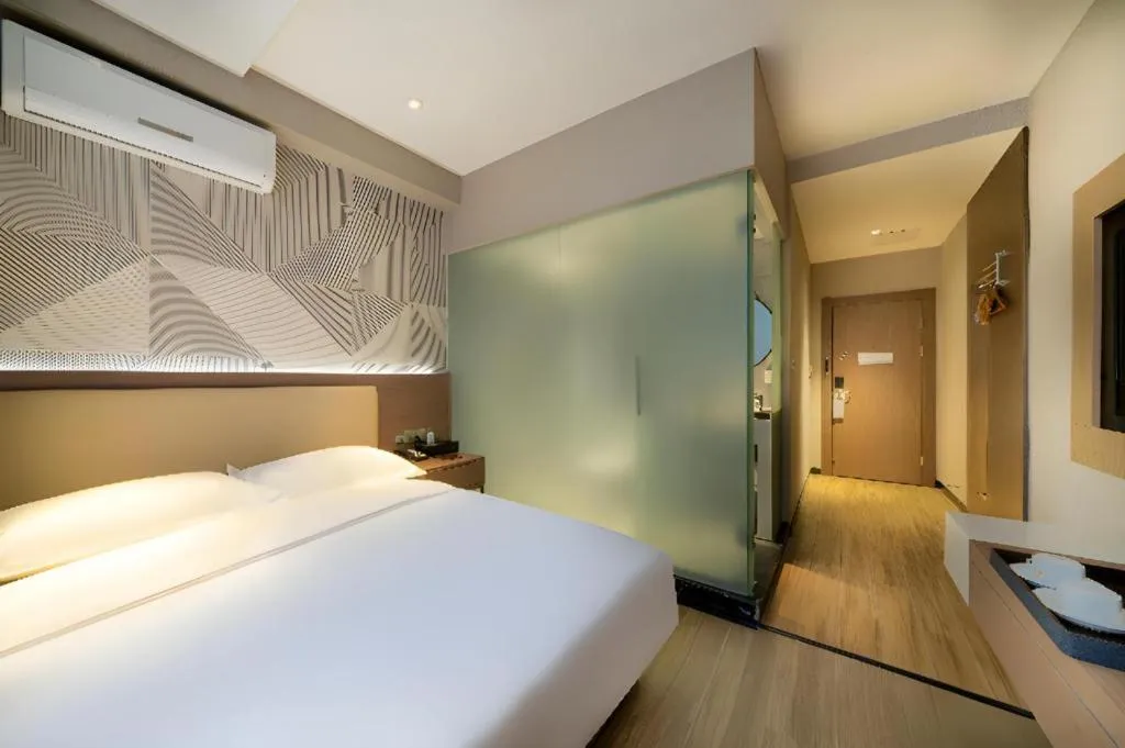 Bed in Borrman Hotel Xiantao Wushang Gymnasium