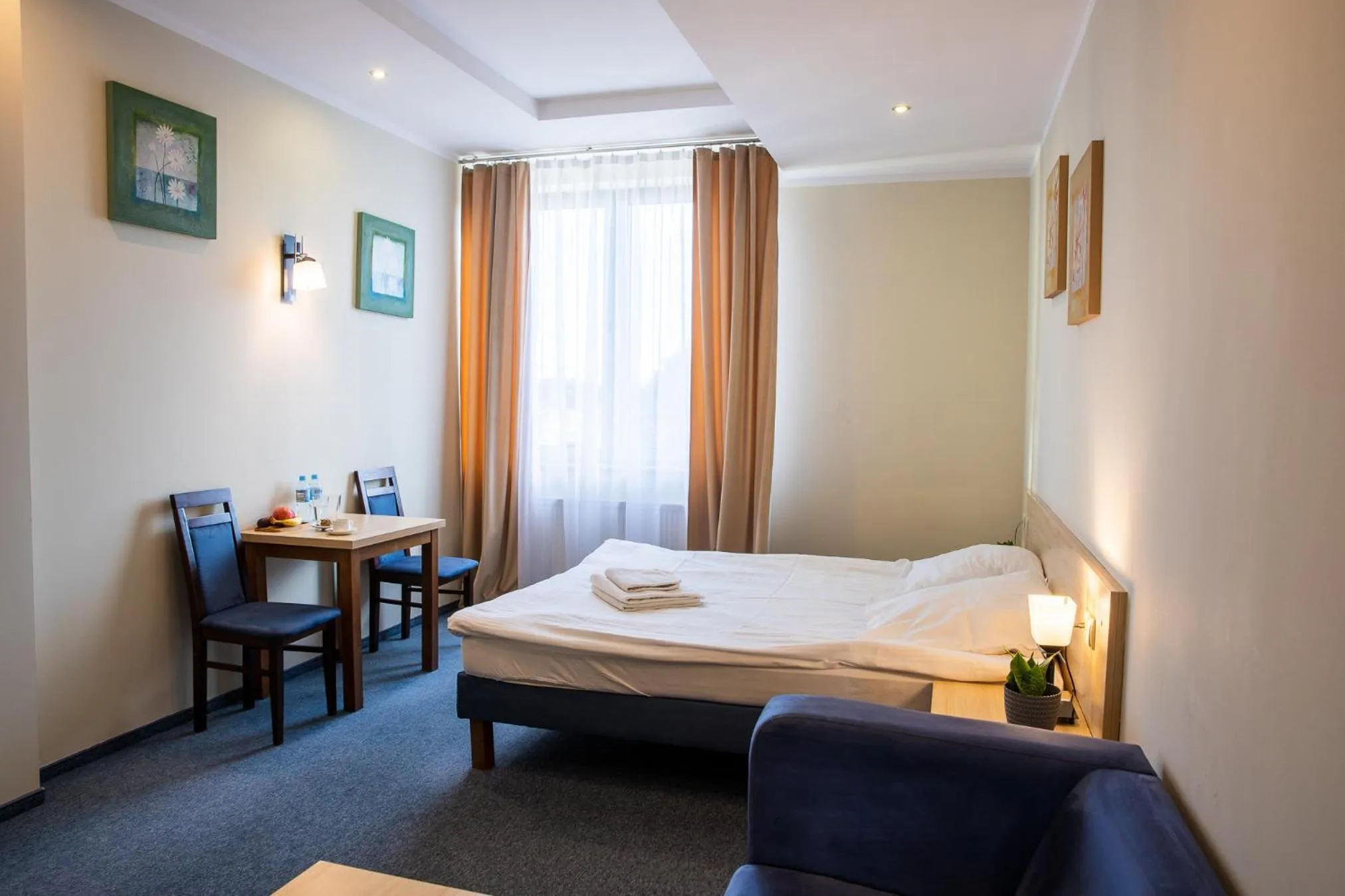 Bed in Hotel Kardamon