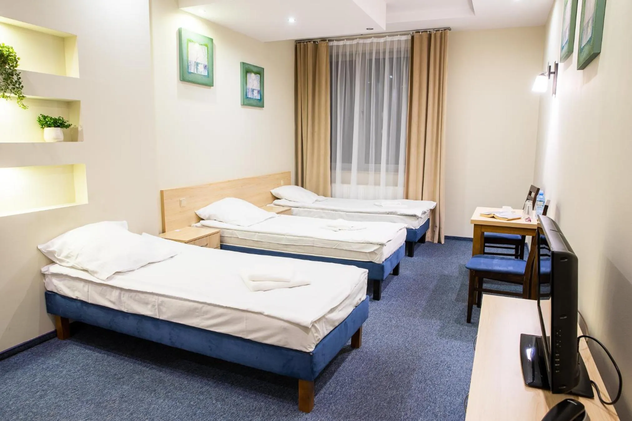 Bed in Hotel Kardamon