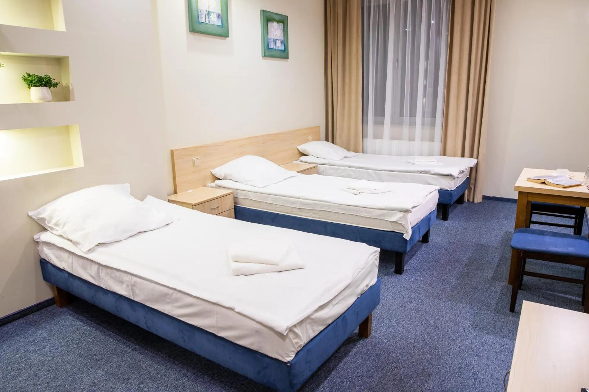 Bed in Hotel Kardamon