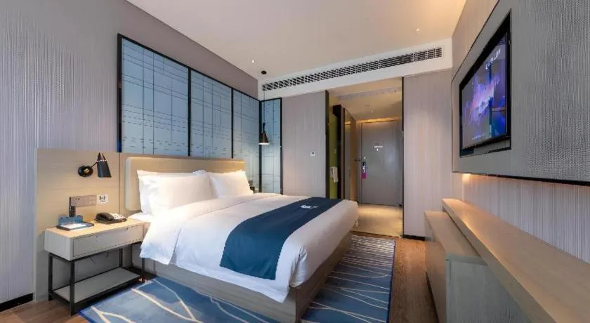 Bed in Echarm Hotel Wuhan Huashan