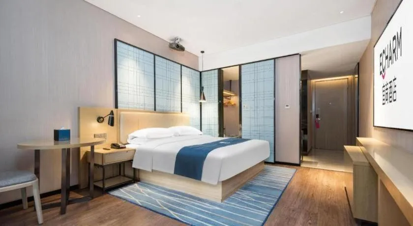 Bed in Echarm Hotel Wuhan Huashan