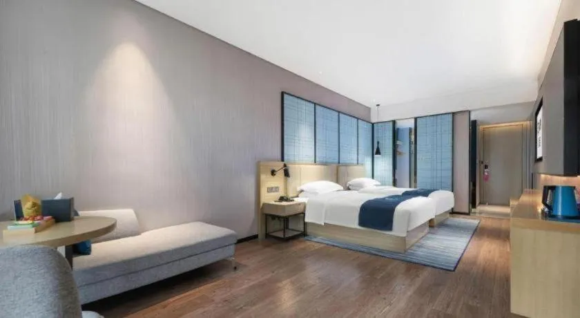 Bed in Echarm Hotel Wuhan Huashan