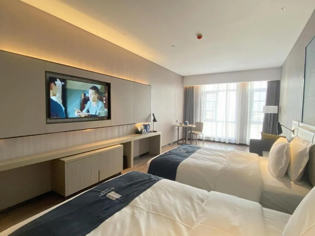 Bed in Echarm Hotel Wuhan Huashan