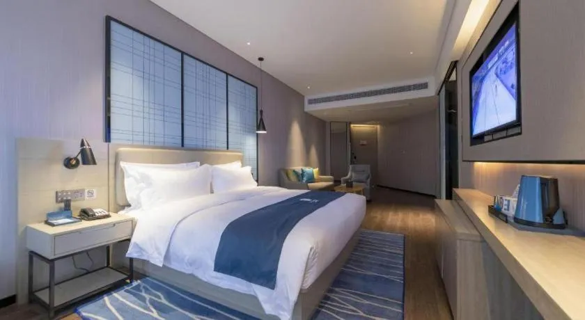 Bed in Echarm Hotel Wuhan Huashan