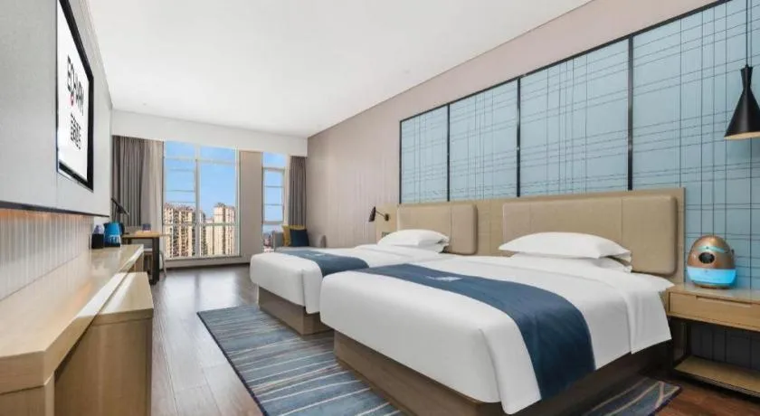 Bed in Echarm Hotel Wuhan Huashan