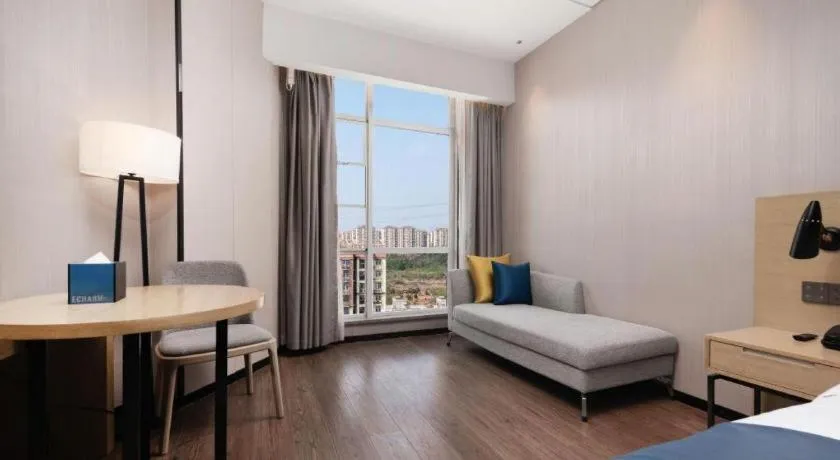 Bed in Echarm Hotel Wuhan Huashan