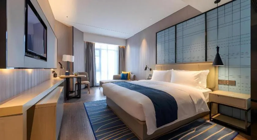 Bed in Echarm Hotel Wuhan Huashan