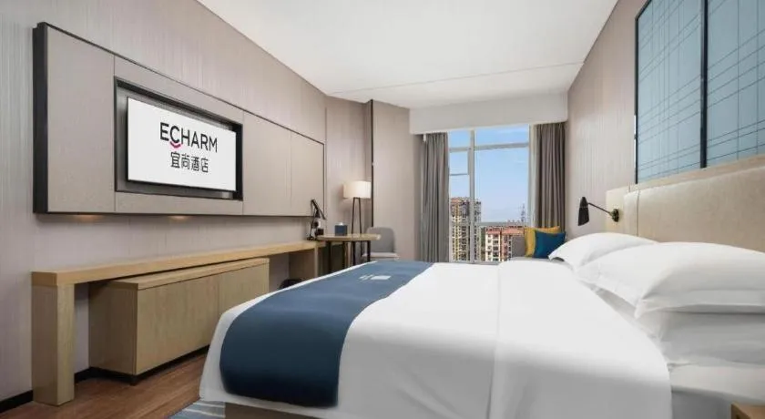 Bed in Echarm Hotel Wuhan Huashan