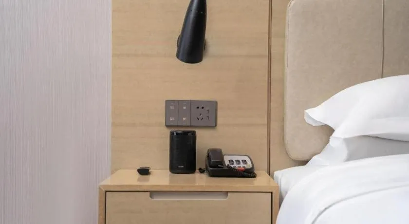 Bed in Echarm Hotel Wuhan Huashan