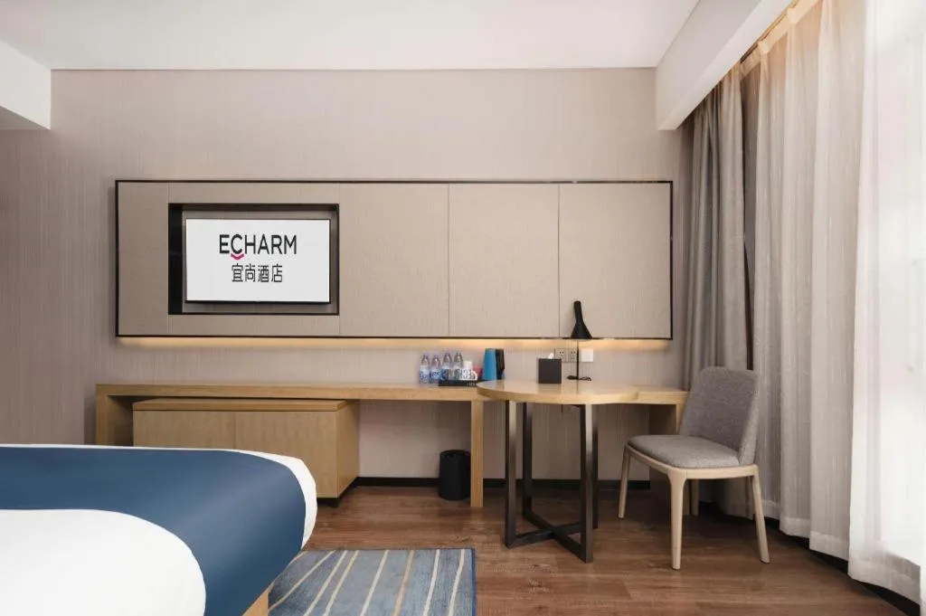 Bed in Echarm Hotel Wuhan Huashan