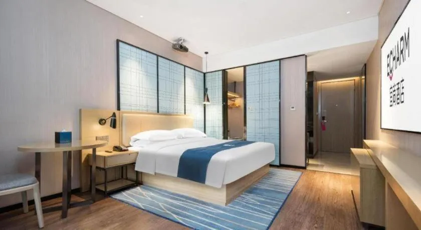 Bed in Echarm Hotel Wuhan Huashan