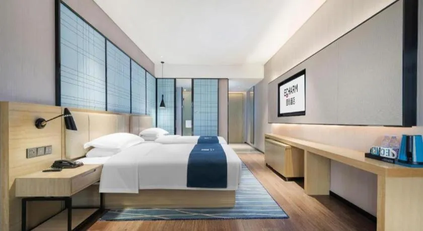 Bed in Echarm Hotel Wuhan Huashan