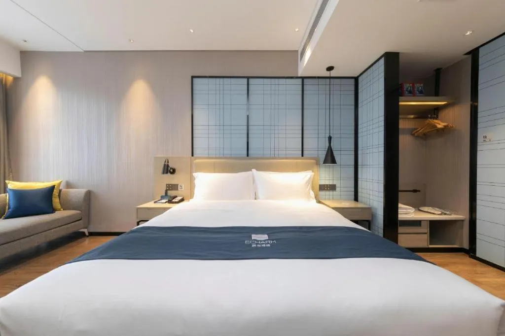 Bed in Echarm Hotel Wuhan Huashan