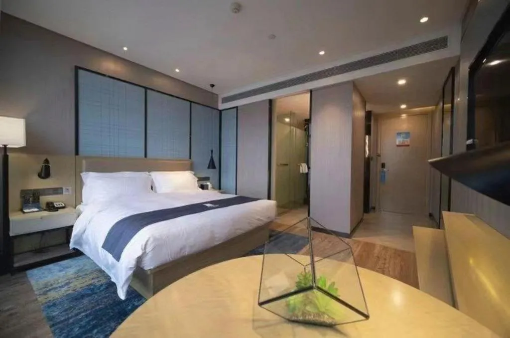 Bed in Echarm Hotel Wuhan Huashan