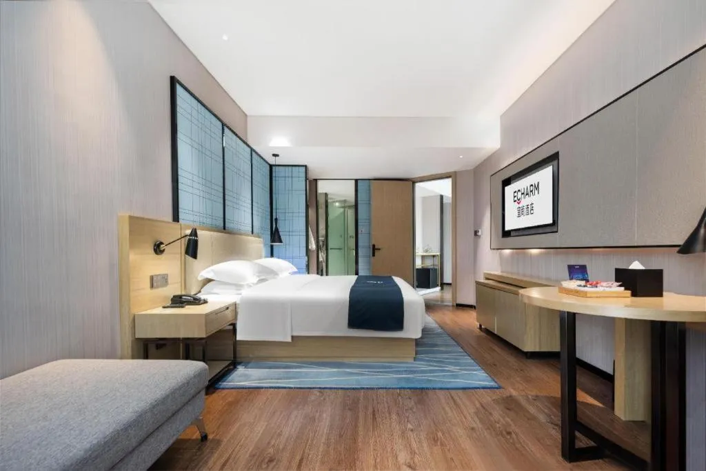 Bed in Echarm Hotel Wuhan Huashan