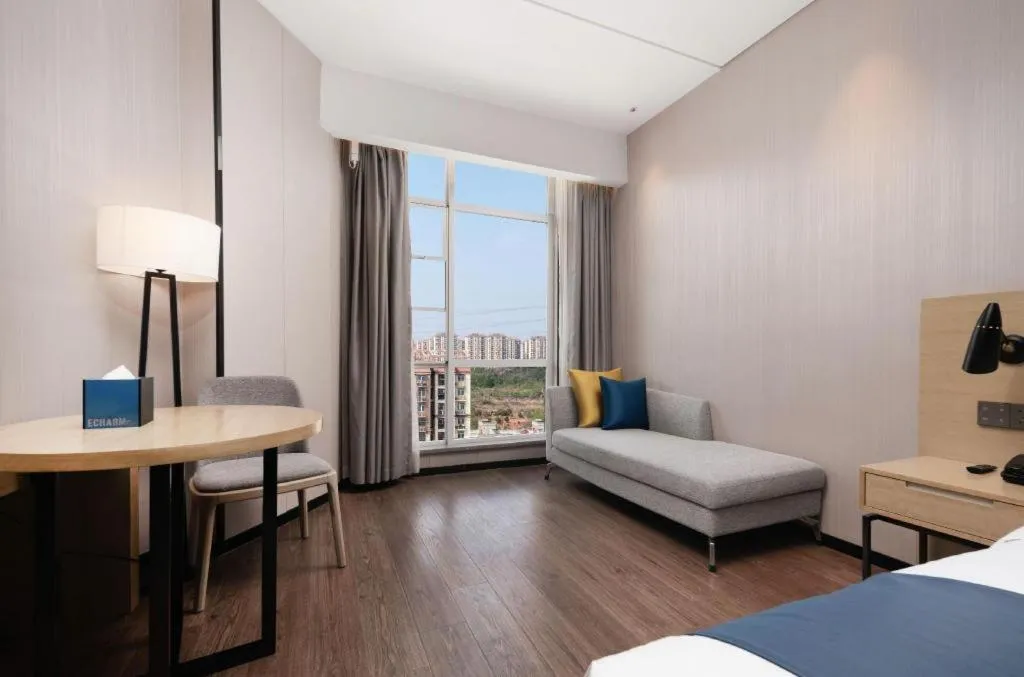 Bed in Echarm Hotel Wuhan Huashan