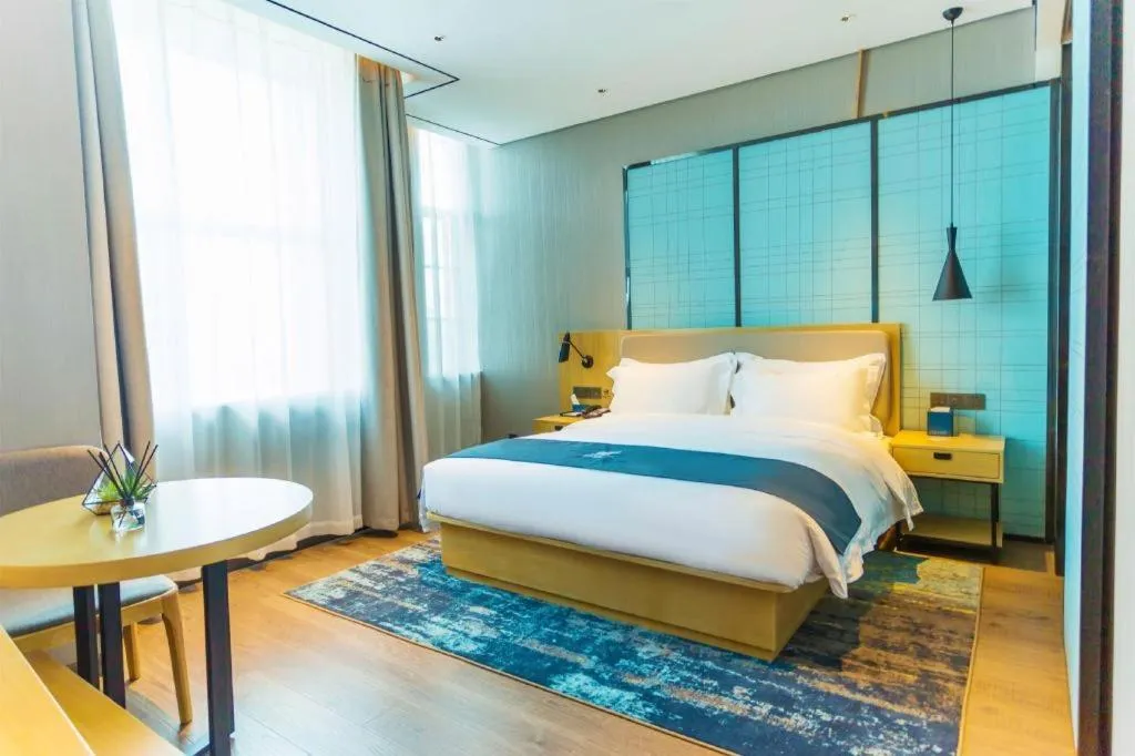 Bed in Echarm Hotel Wuhan Huashan