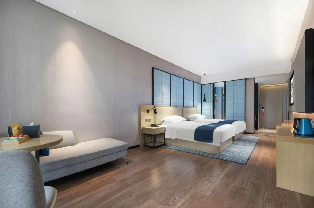 Bed in Echarm Hotel Wuhan Huashan