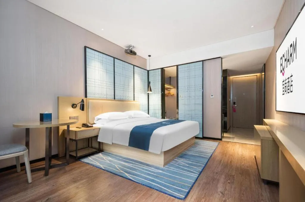 Bed in Echarm Hotel Wuhan Huashan