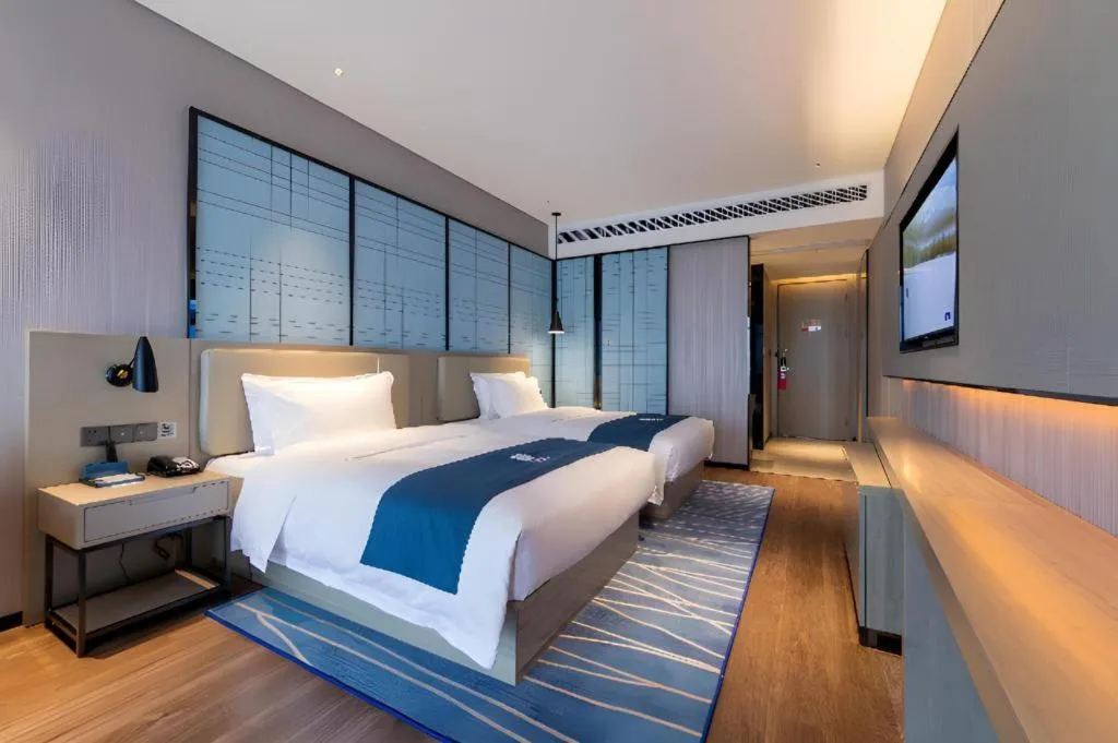 Bed in Echarm Hotel Wuhan Huashan