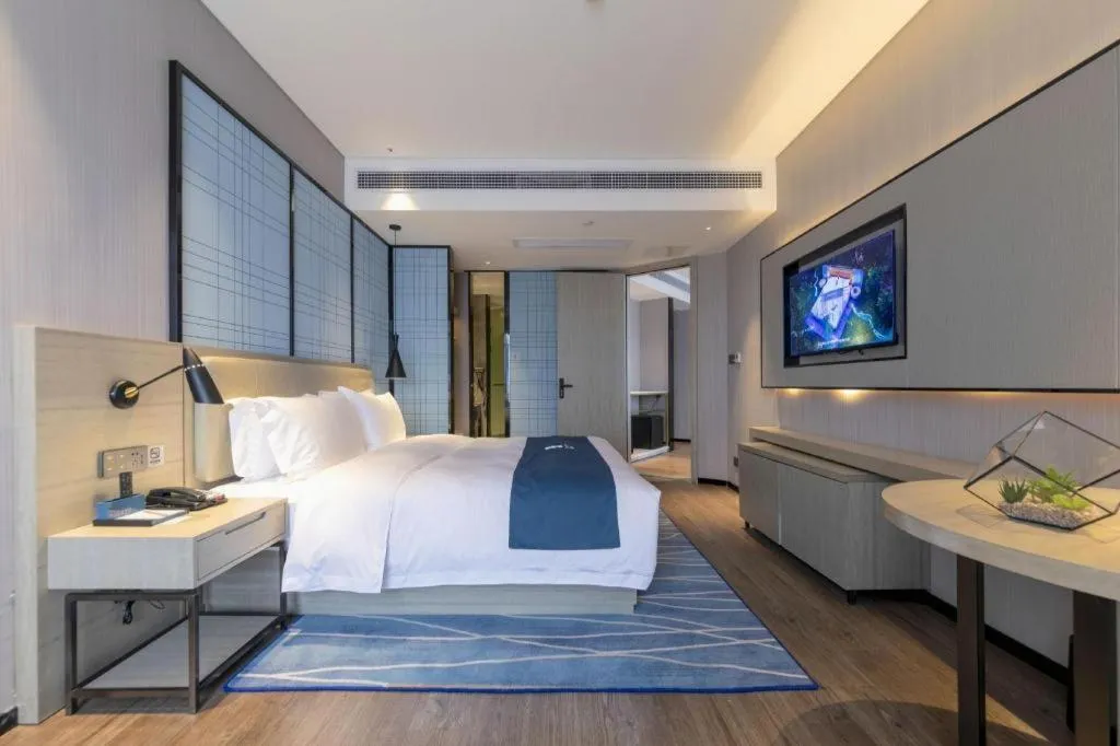 Bed in Echarm Hotel Wuhan Huashan