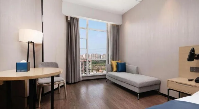 Bed in Echarm Hotel Wuhan Huashan