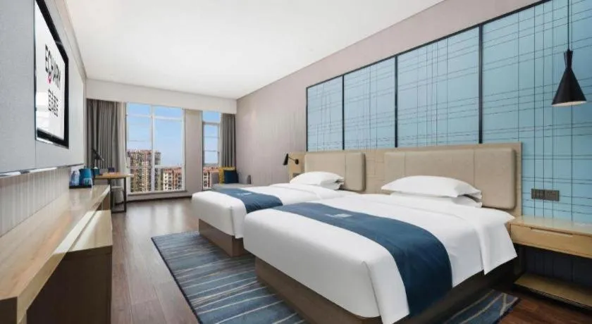 Bed in Echarm Hotel Wuhan Huashan