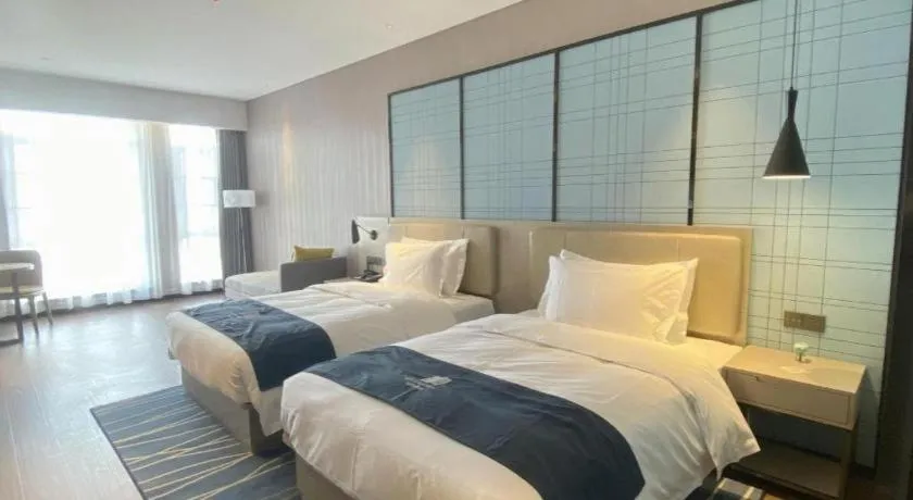 Bed in Echarm Hotel Wuhan Huashan